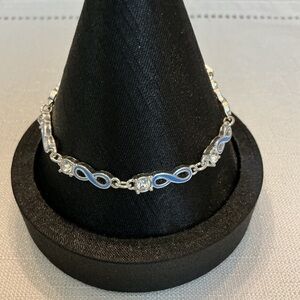 Avon Silver and Blue Infinity Bracelet